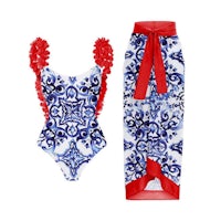 a blue and white swimsuit with a red and white print